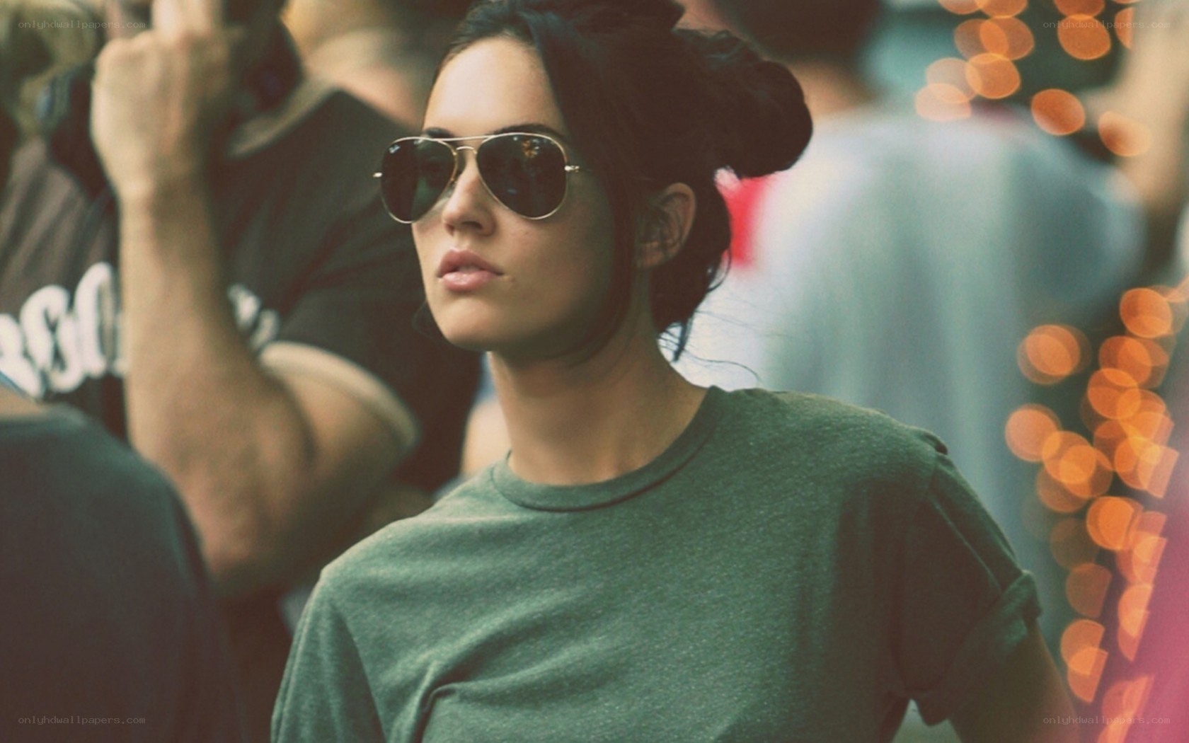 woman in sunglasses at event