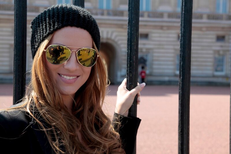 woman in sunglasses at palace