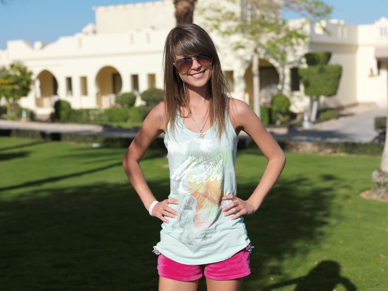 woman in sunglasses at resort