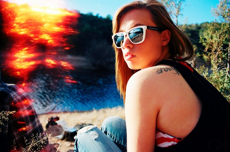 woman in sunglasses at sunset