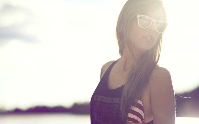 woman in sunglasses at sunset