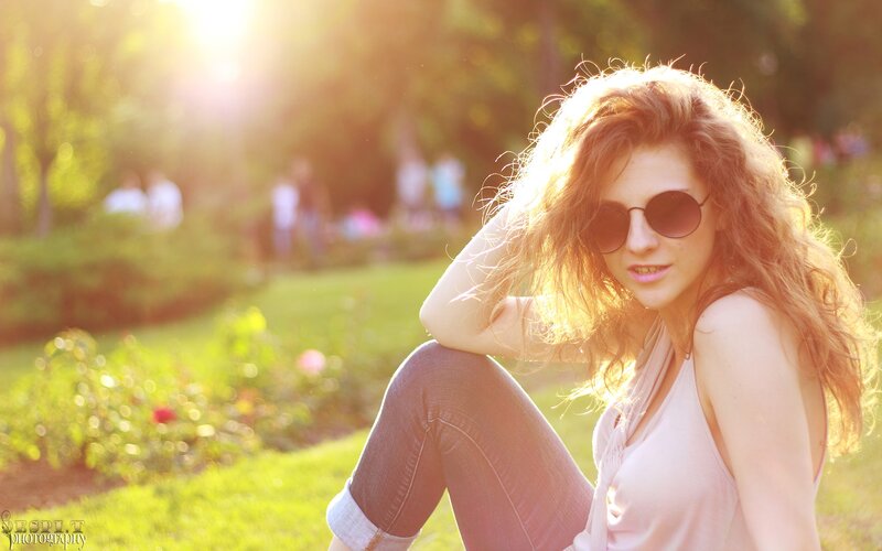 woman in sunglasses at sunset