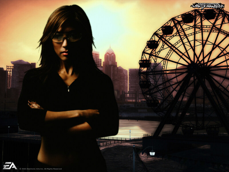 Woman in sunglasses by ferris wheel