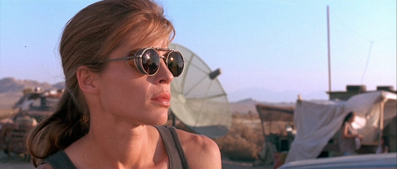 woman in sunglasses in desert
