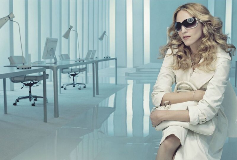 woman in sunglasses in office