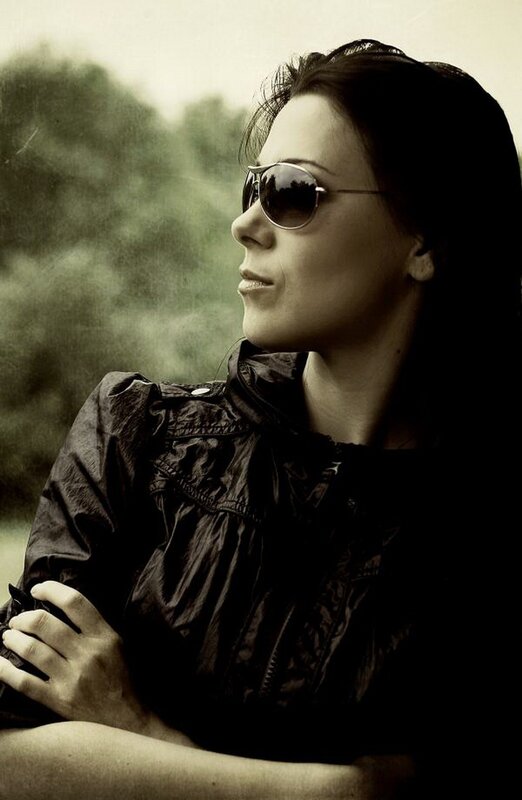 woman in sunglasses looking away