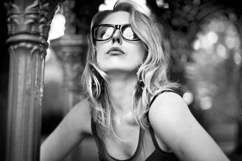 woman in sunglasses looking up