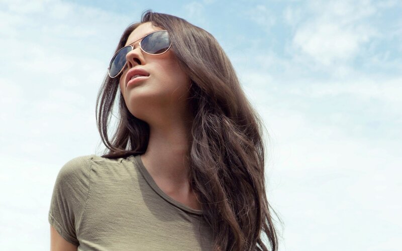 woman in sunglasses looking up
