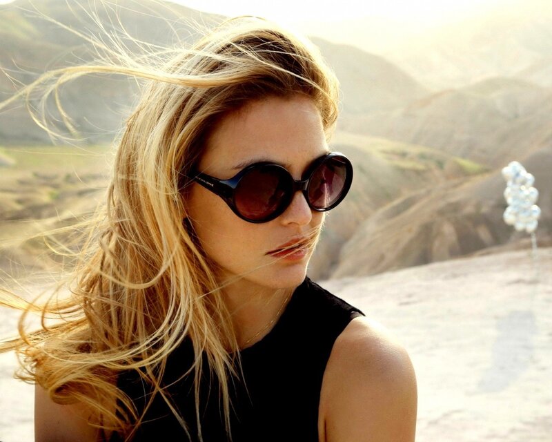 woman in sunglasses on a hill