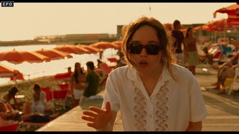 Woman in Sunglasses on Beach — Orange