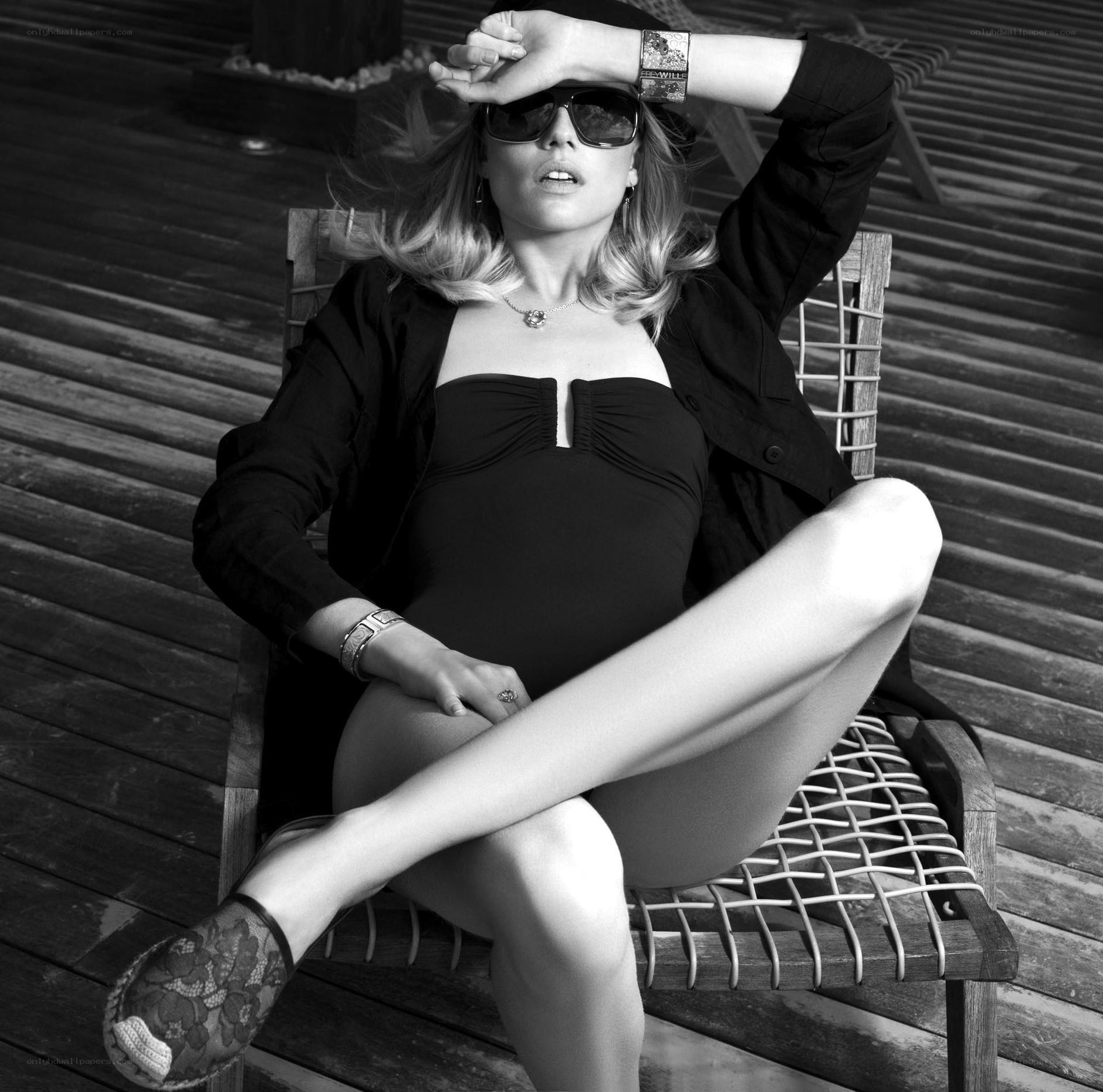 woman in sunglasses on deck