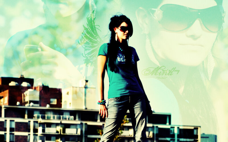 woman in sunglasses on rooftop