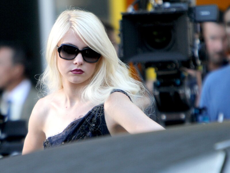 woman in sunglasses on set