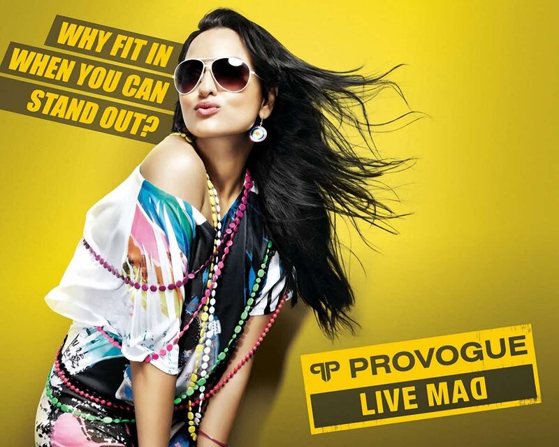 woman in sunglasses on yellow