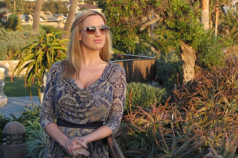 Woman in sunglasses outdoors