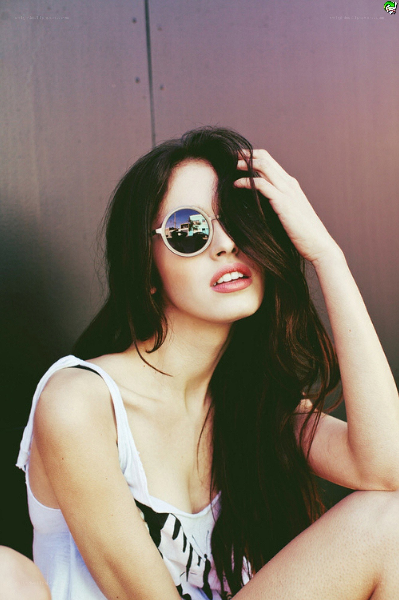 woman in sunglasses posing