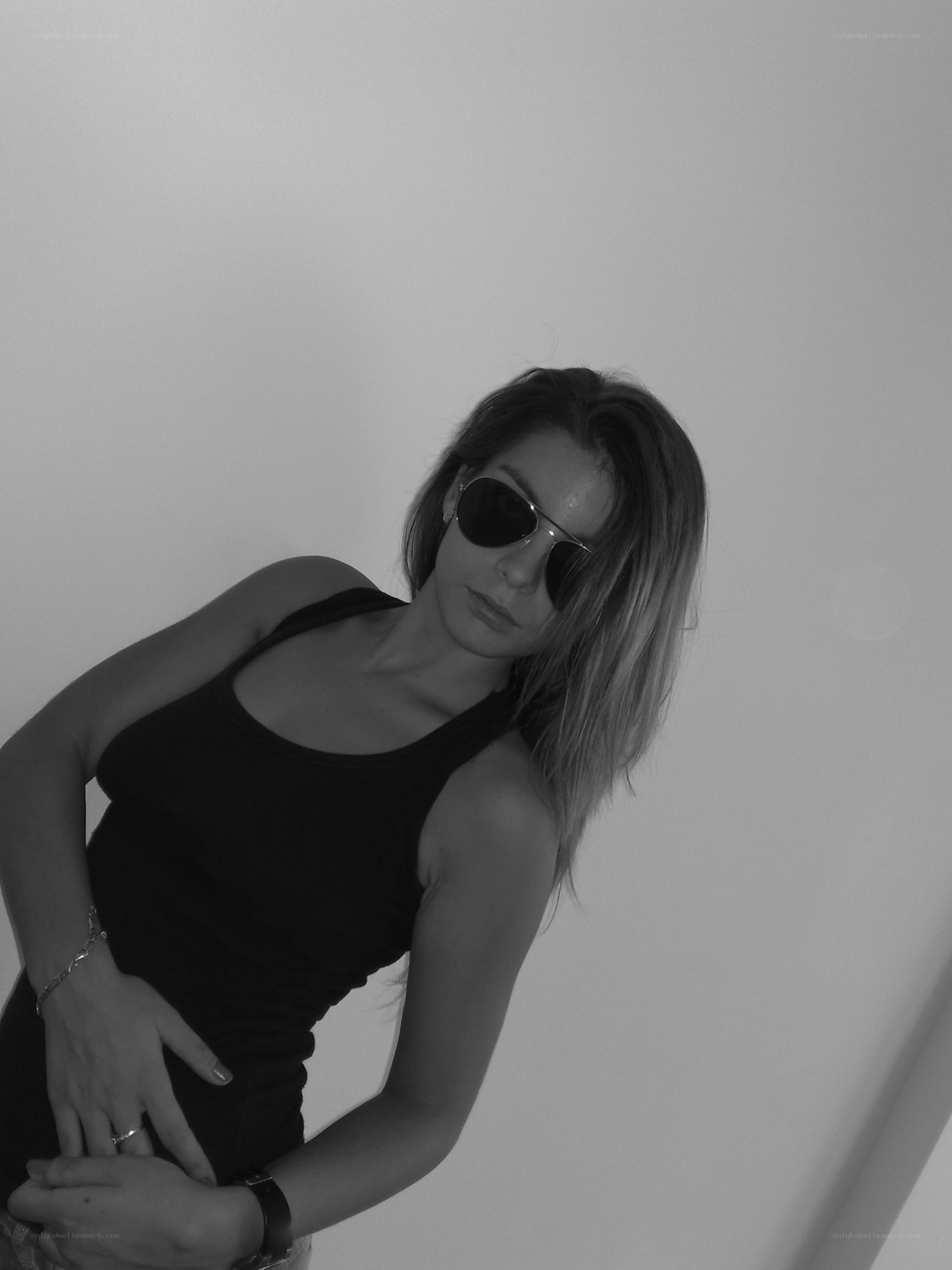 woman in sunglasses posing
