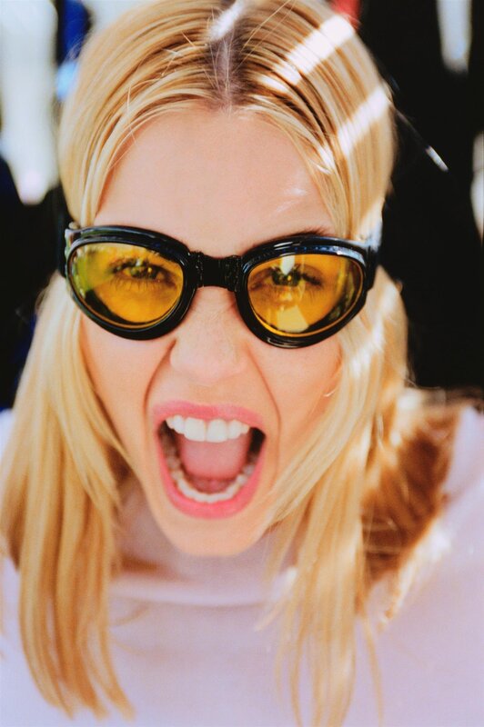 woman in sunglasses screaming