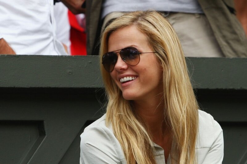 woman in sunglasses smiling