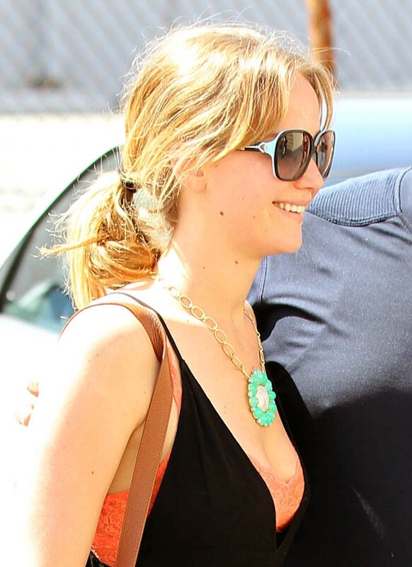 woman in sunglasses smiling