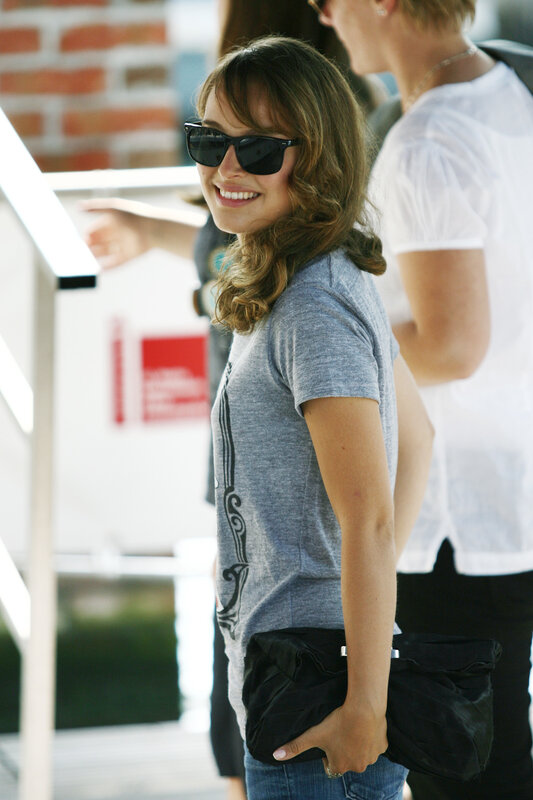woman in sunglasses smiling