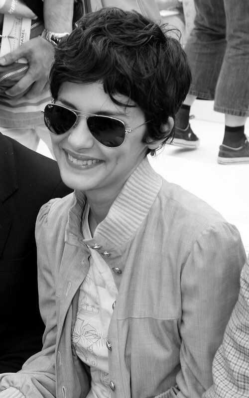 woman in sunglasses smiling