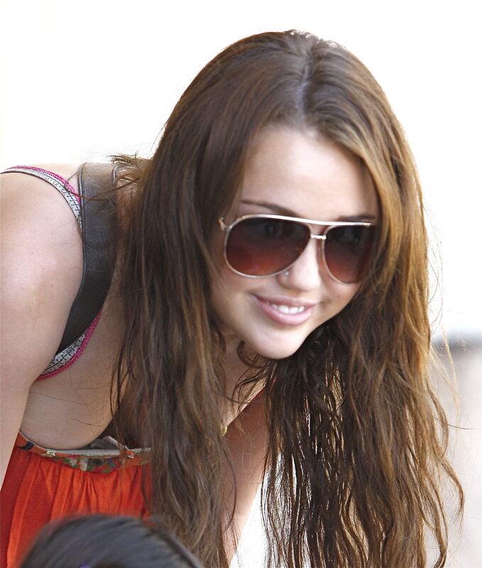 woman in sunglasses smiling