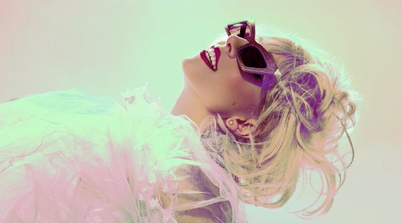 woman in sunglasses smiling