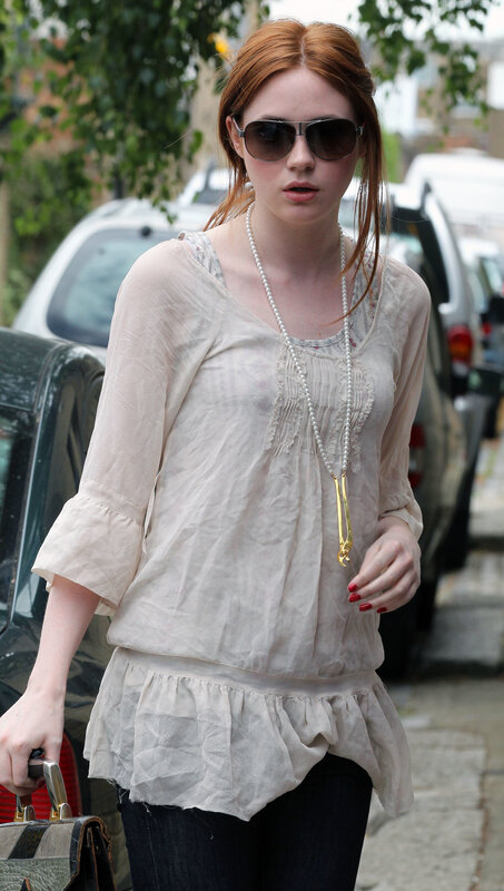 woman in sunglasses walking