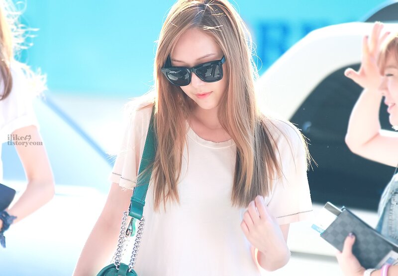 woman in sunglasses walking