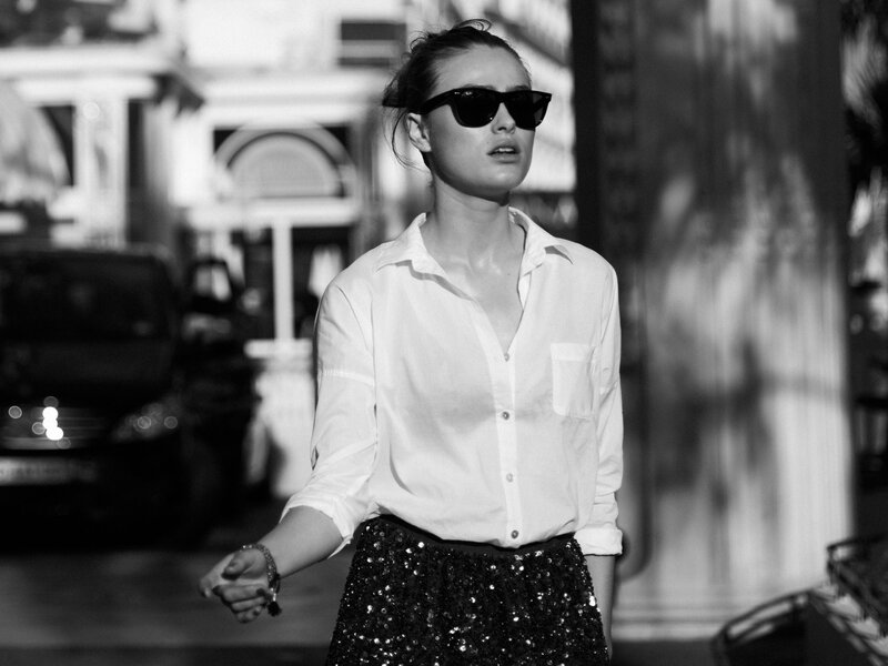 woman in sunglasses walking