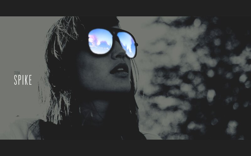 woman in sunglasses with sky reflection