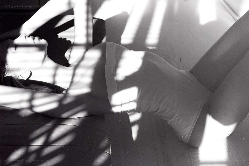 woman in sunlight shadows