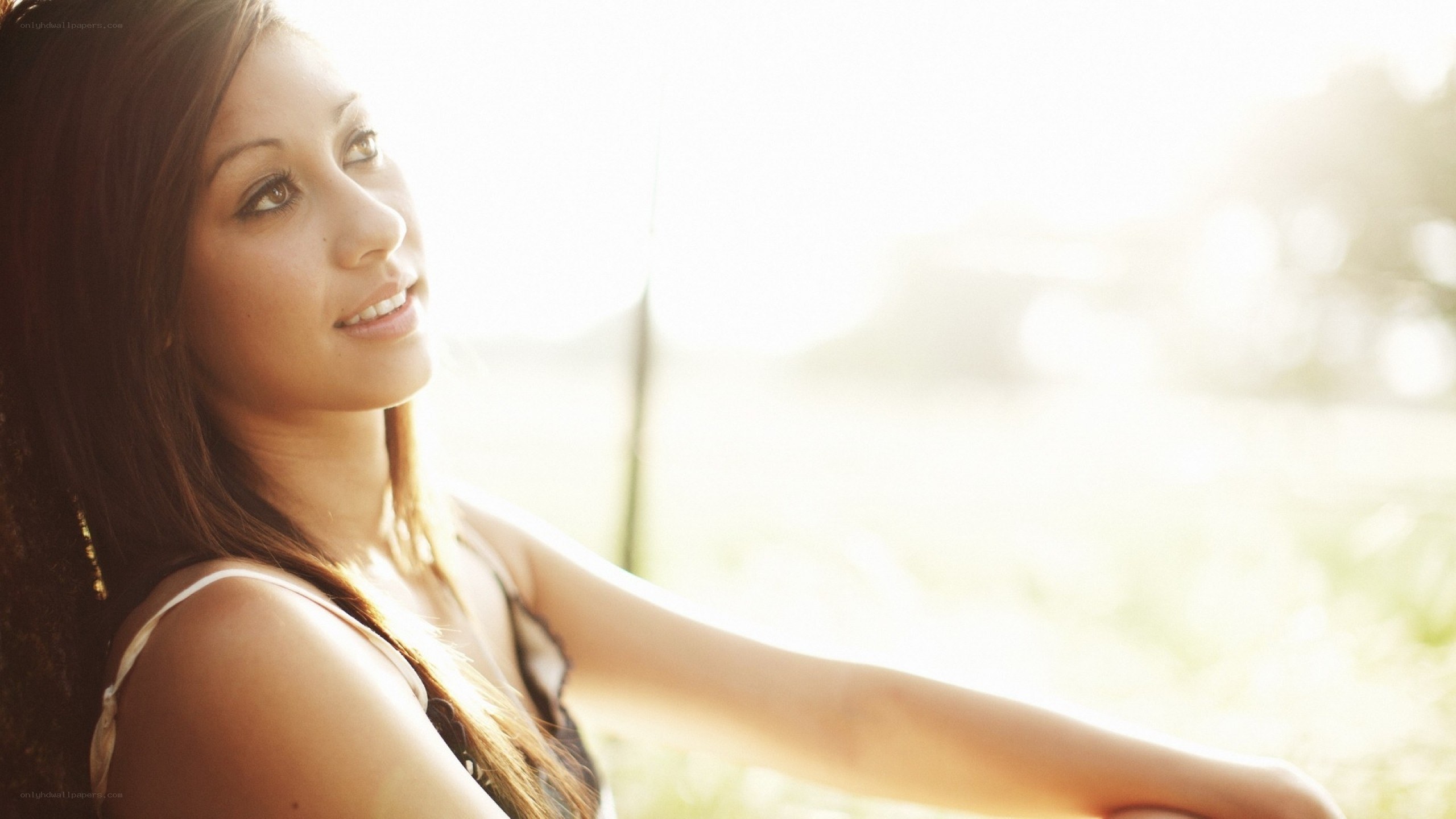 woman in sunlight smiling