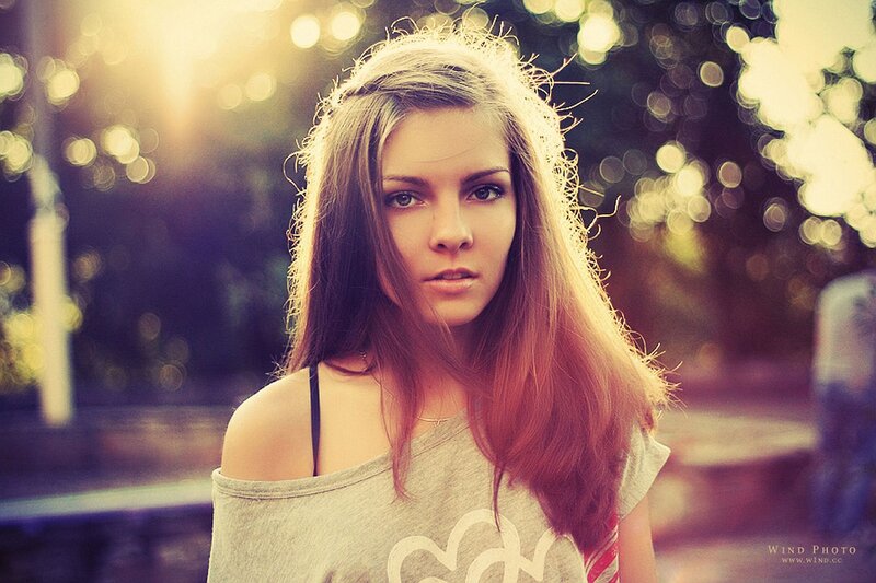 woman in sunlight with bokeh