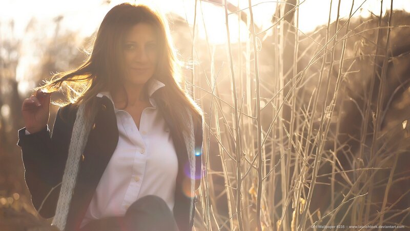 woman in sunlit field
