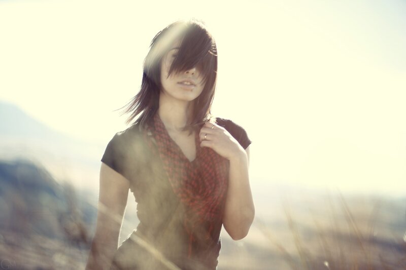 woman in sunlit field