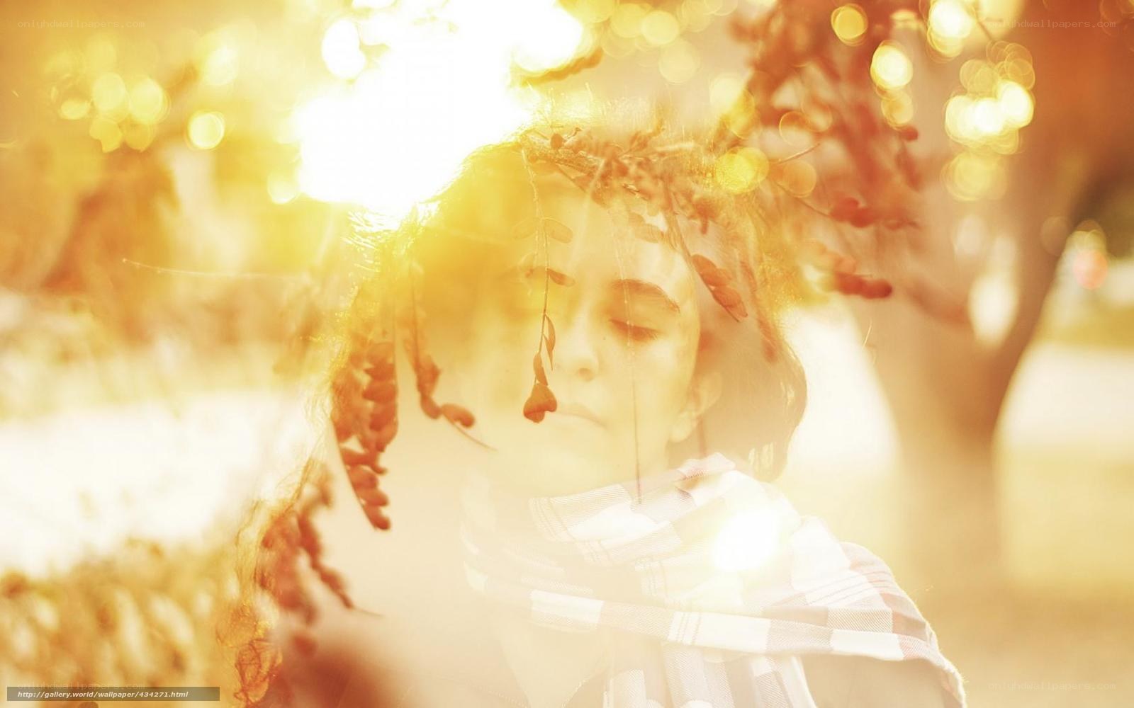woman in sunlit forest
