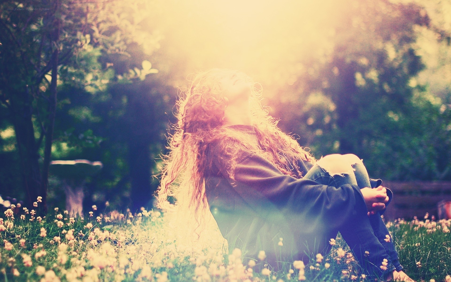 woman in sunlit garden