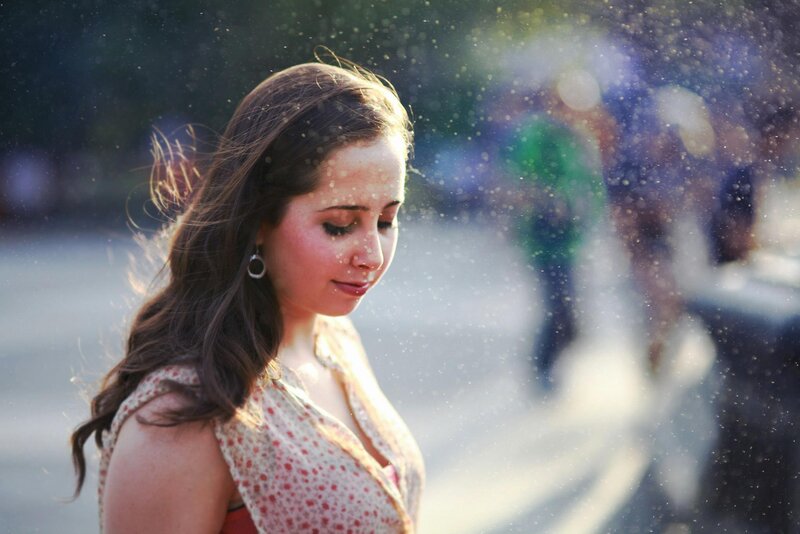 woman in sunlit spray