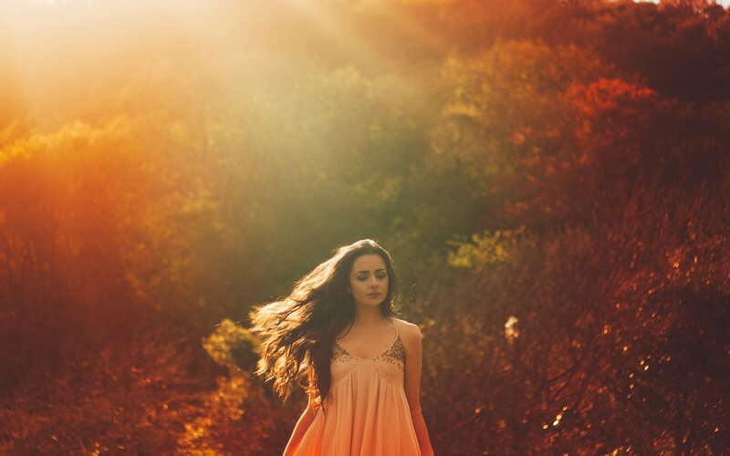 woman in sunset field