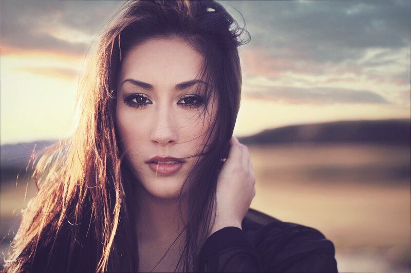 woman in sunset landscape
