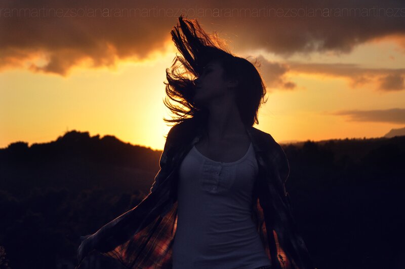 woman in sunset silhouette