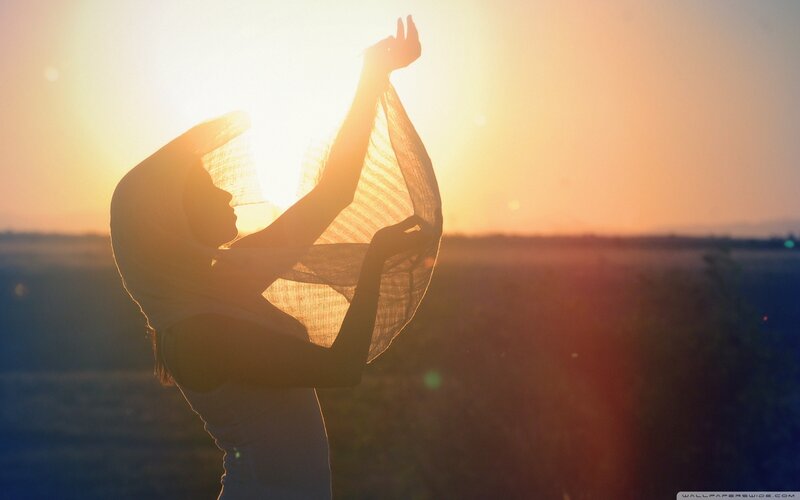 woman in sunset silhouette
