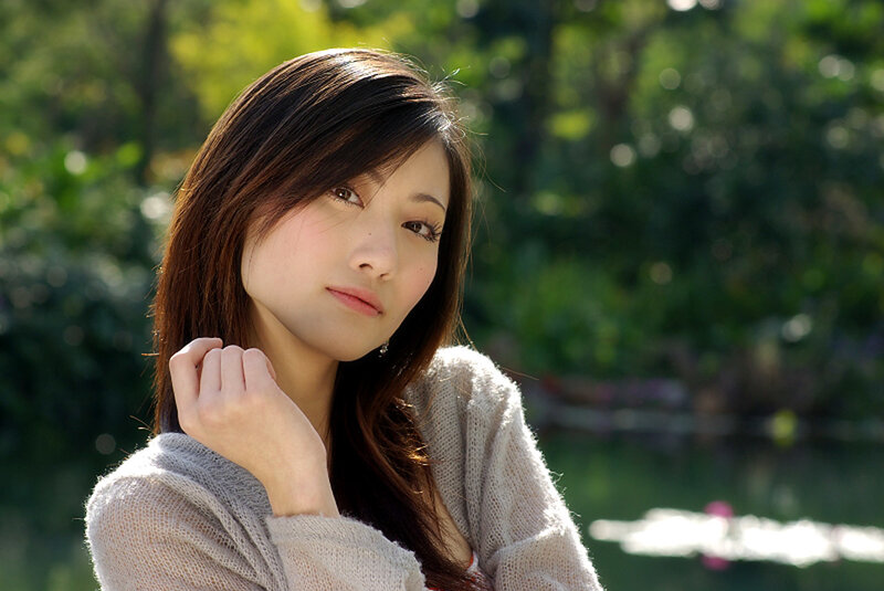woman in sweater outdoors