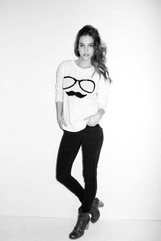 woman in sweater with glasses design