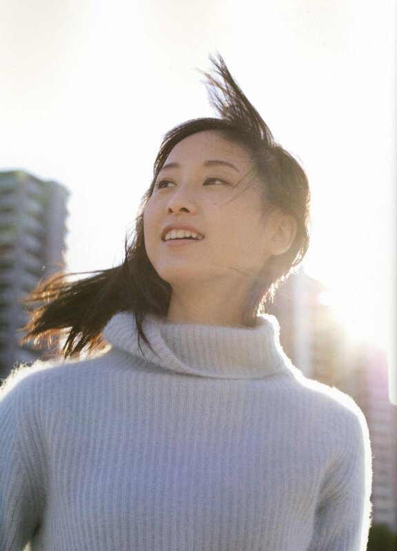 woman in sweater with wind