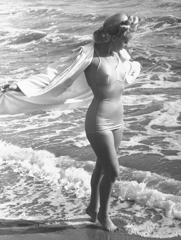 Woman in swimsuit at beach