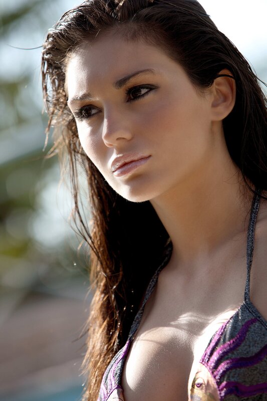 woman in swimsuit by pool