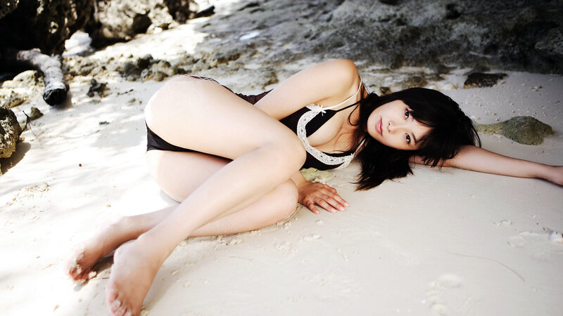 woman in swimsuit on beach